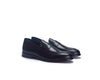 A pair of black leather penny loafers with a classic cap-toe design and subtle stitching, displayed on a clean white background.