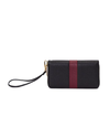 Black and burgundy purse with Dalk-bit logo