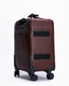 Cinnamon Brown leather luggage with Dalk-bit logo
